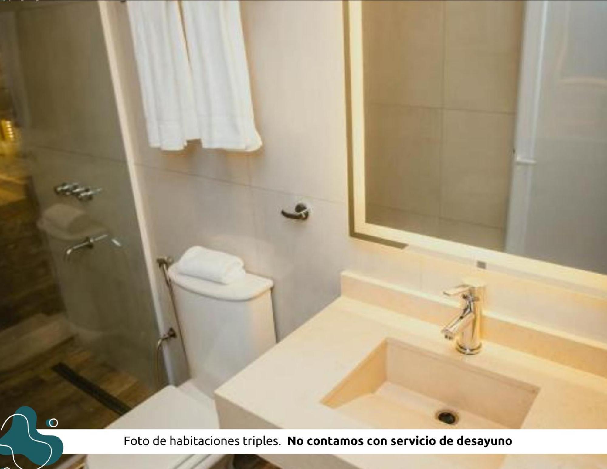 Z Hotel Boutique Пуэрто-Игуасу Экстерьер фото